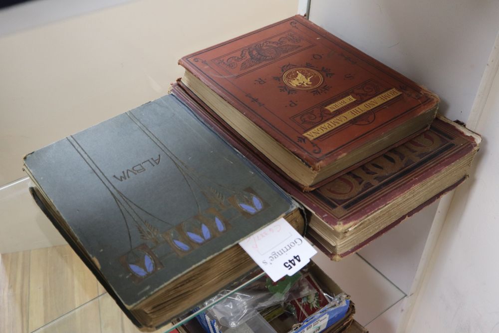 A topographical postcard album including India and Chinese views and two books